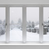 Keeping Your Heat During Extreme Cold Weather Snowy Roads Through Warm Home's Window